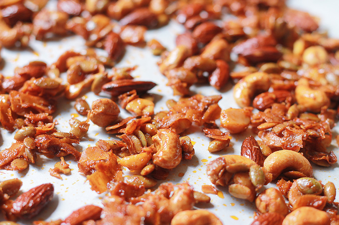 Chipotle trail mix on sheet pan lined with parchment paper.