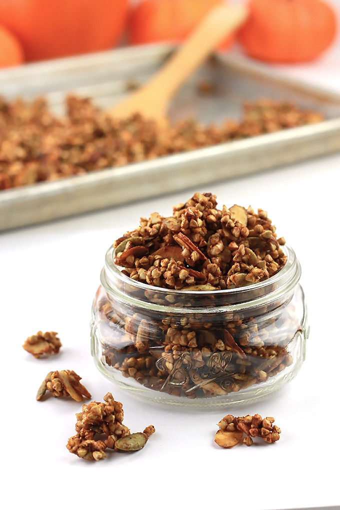 Buckwheat pumpkin clusters in a small ball jar with a pan of clusters in background.