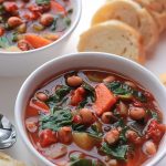 A new take on the old traditional New Year's Black-Eyed Peas and Collard, put them together in a hearty soup.