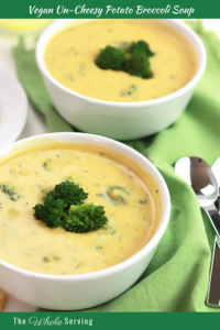 Two bowls of Vegan Un-Cheesy Potato Broccoli Soup garnished with broccoli florets on top.