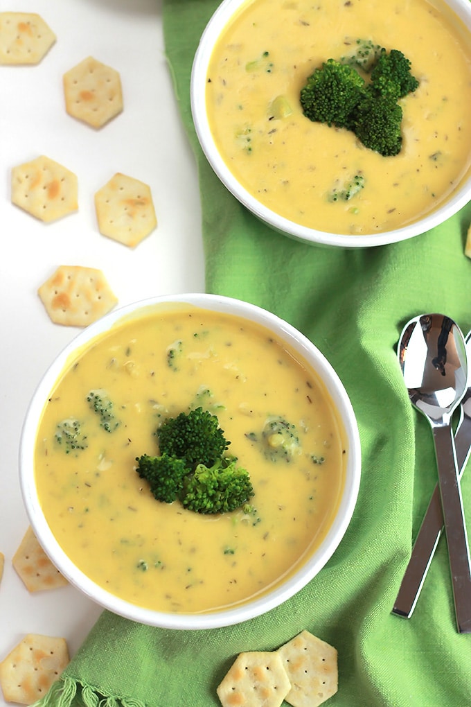Over head shot of Vegan Un-Cheesy Potato Broccoli Soup with crackers on the side.