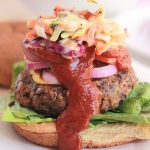 Simply delicious and full of flavor, you have to give this Black Bean Farro Burger a try, and serve it with this super tasty Spicy Slaw.