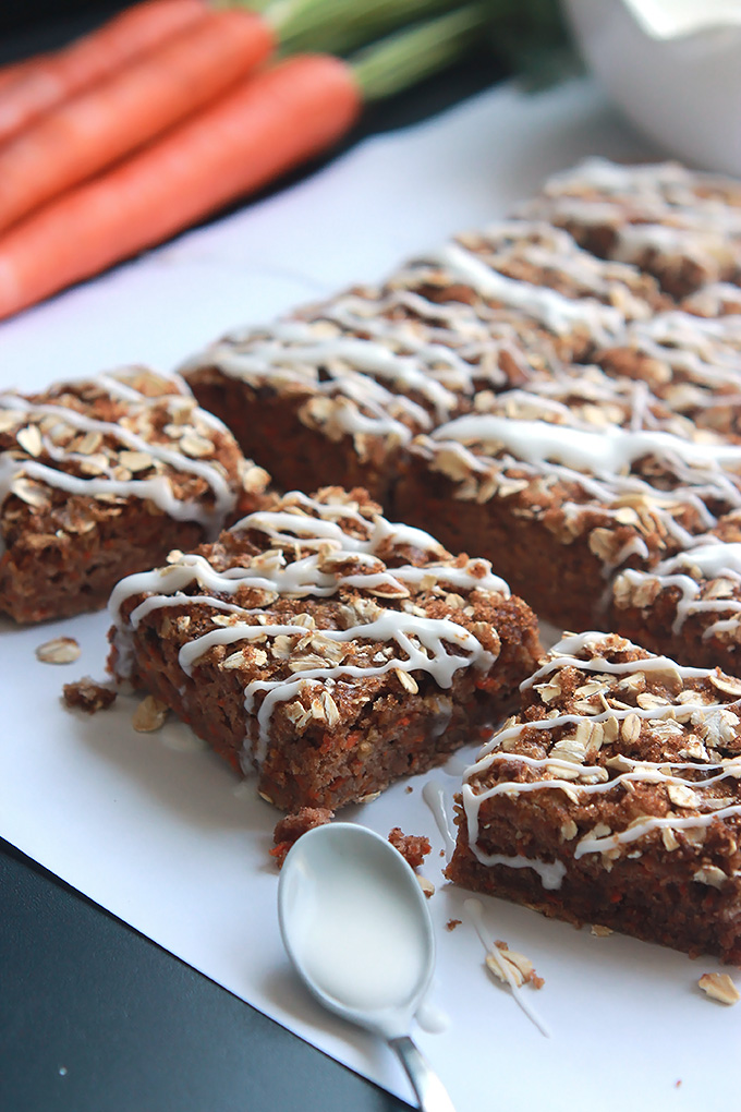 Carrot for breakfast, why not when they're in these moist delicious Vegan Carrot Cake Bars topped with brown sugar, oats and a sweet citrus glaze.