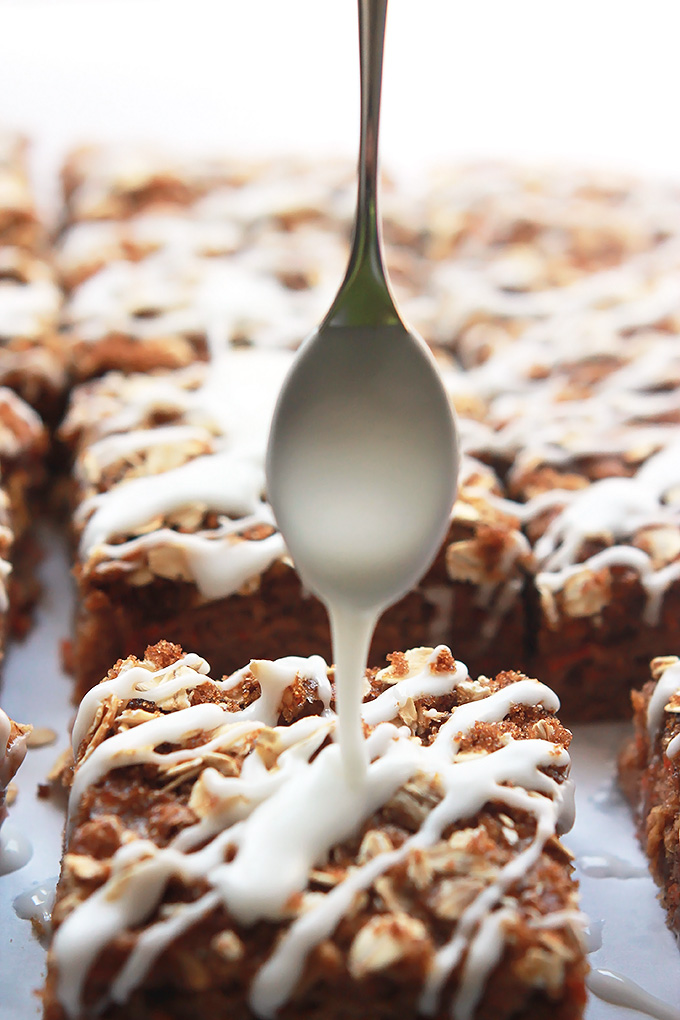 Carrot for breakfast, why not when they're in these moist delicious Carrot Cake Bars topped with brown sugar, oats and a sweet citrus glaze.