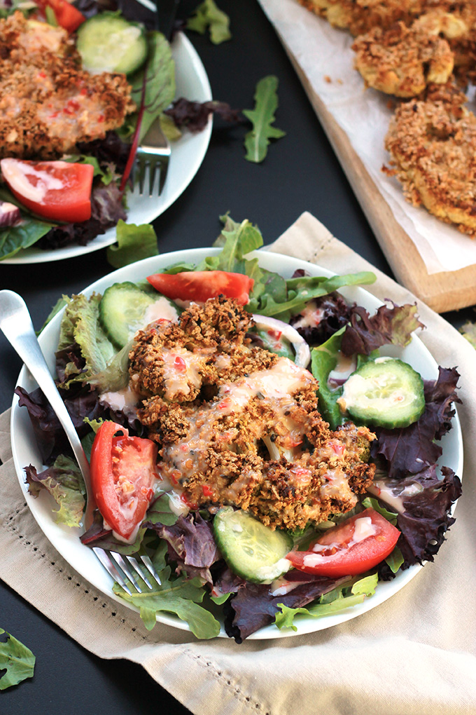 Crispy Baked Cauliflower Steaks - These panko crusted, oven baked cauliflower steaks will blow your taste buds away. You have to give them one a try!