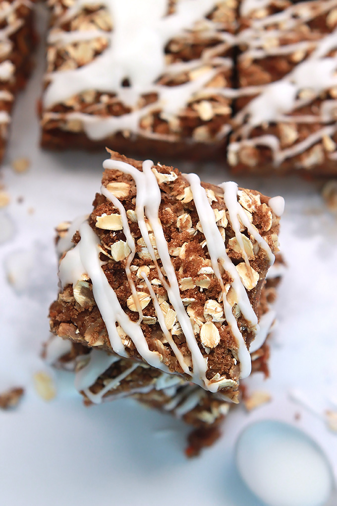 Carrot for breakfast, why not when they're in these moist delicious Vegan Carrot Cake Bars topped with brown sugar, oats and a sweet citrus glaze.