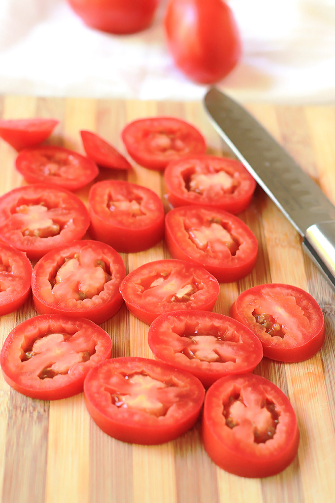 Simple, easy and delicious - Roasted Tomato Avocado Toast. Creamy Avocado mash, sweet roasted tomatoes, drizzled with balsamic glaze, it takes toast to a whole new level.