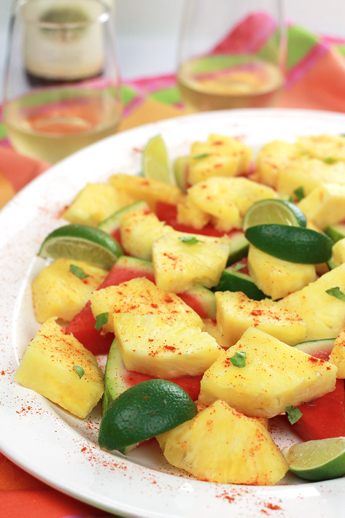 Spiced Pineapple & Watermelon - sweet juicy pineapple and watermelon slices, sprinkled with hot chili pepper and a twist of lime.What a wonderful way to spice it up!