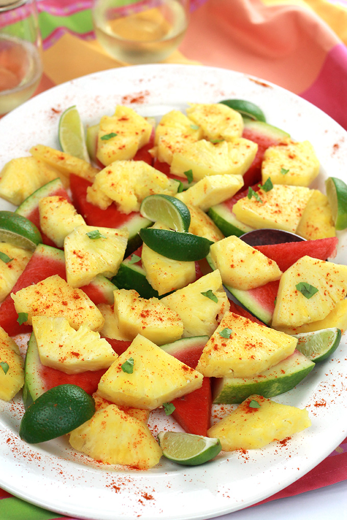 Spiced Pineapple & Watermelon - sweet juicy pineapple and watermelon slices, sprinkled with hot chili pepper and a twist of lime.What a wonderful way to spice it up!