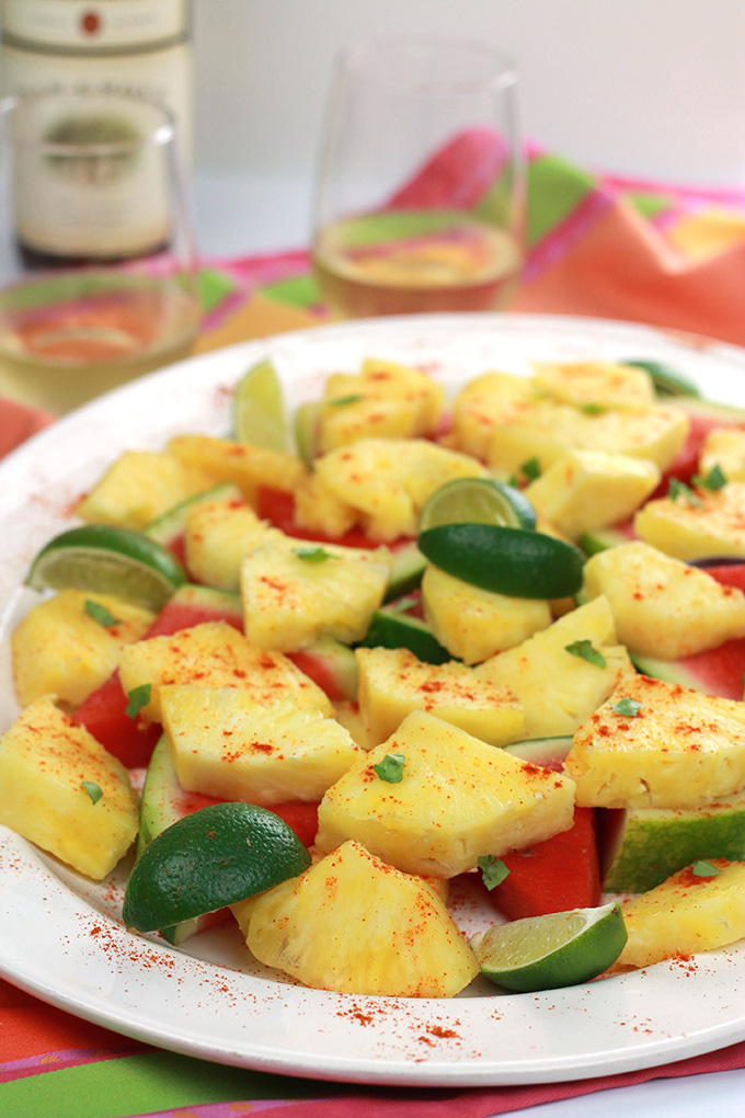 Spiced Pineapple & Watermelon - sweet juicy pineapple and watermelon slices, sprinkled with hot chili pepper and a twist of lime.What a wonderful way to spice it up!