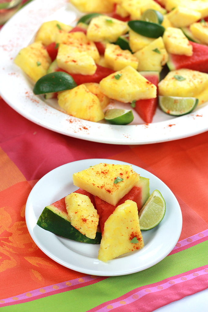 Spiced Pineapple & Watermelon - sweet juicy pineapple and watermelon slices, sprinkled with hot chili pepper and a twist of lime.What a wonderful way to spice it up!