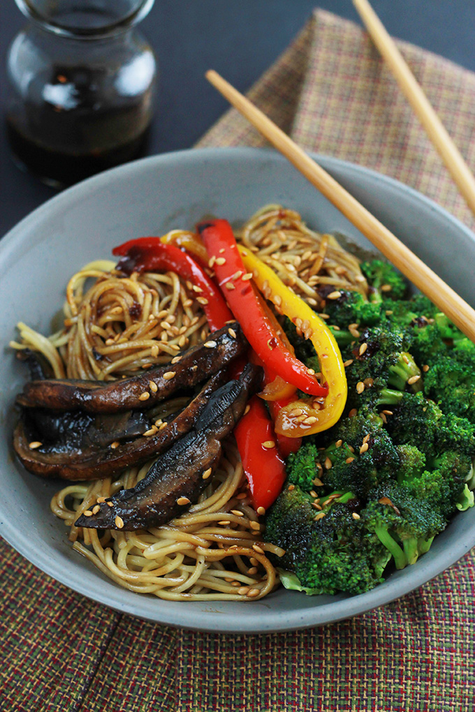 Spicy Ramen Vegetable Stir-Fry in a bowl with red and yellow peppers, mushrooms and broccoli. .