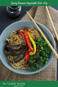 Above bowl of Spicy Ramen Stir-fry with ramen noodles, red and yellow peppers, mushrooms and broccoli in a bowl.