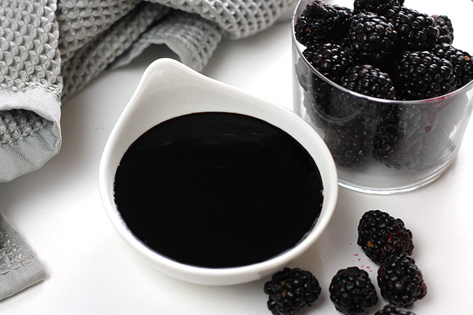 This Blackberry Balsamic Glaze is rich, smooth and creamy, lightly sweetened with maple syrup and loaded with plump juicy blackberries. Delicious on just about anything.