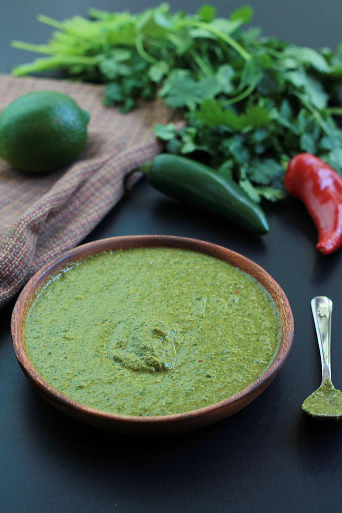 Cilantro Chutney with Heirloom Tomato Salad will amaze your tastebuds. This Cilantro Chutney is a bold and spicy Indian condiment perfect for sandwiches, snacks and so much more. Have fun exploring the possibilities.