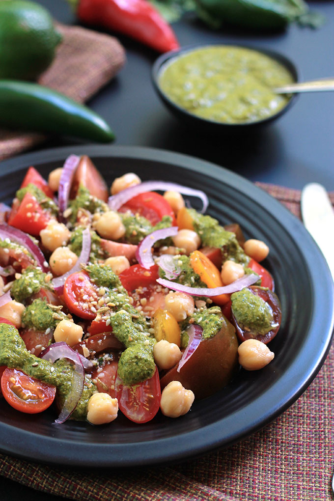 Cilantro Chutney with Heirloom Tomato Salad will amaze your tastebuds. This Cilantro Chutney is a bold and spicy Indian condiment perfect for sandwiches, snacks and so much more. Have fun exploring the possibilities.