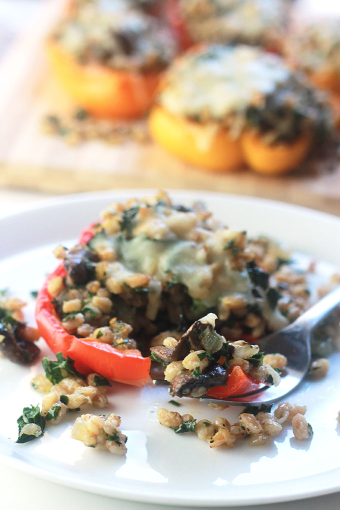 Kale & Farro Stuffed Peppers-Packed full of nutritious farro filled with protein and fiber. Perfect weeknight dinner with a large green salad.