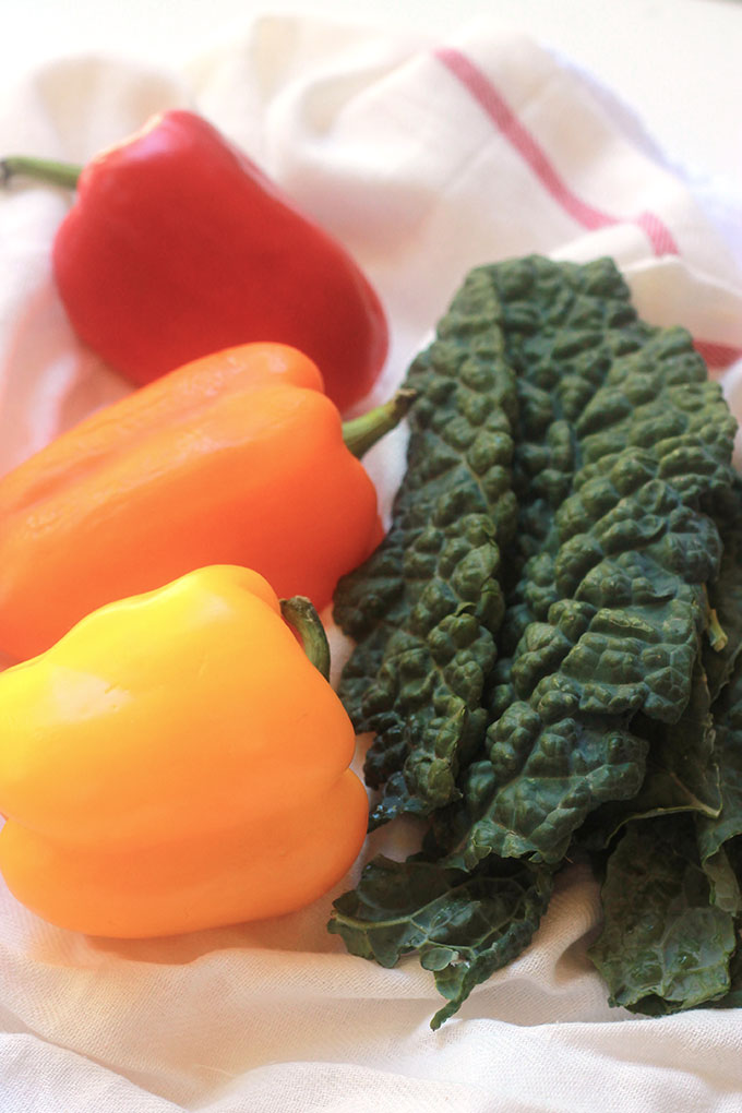 Kale & Farro Stuffed Peppers-Packed full of nutritious farro filled with protein and fiber. Perfect weeknight dinner with a large green salad.