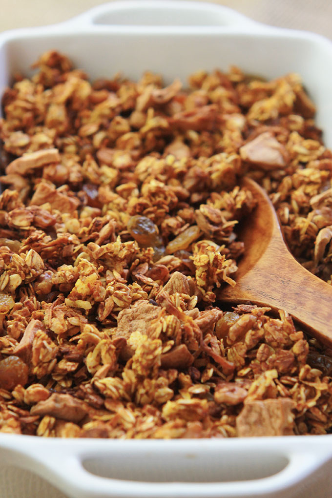 Baking dish filled with pumpkin apple cinnamon granola.