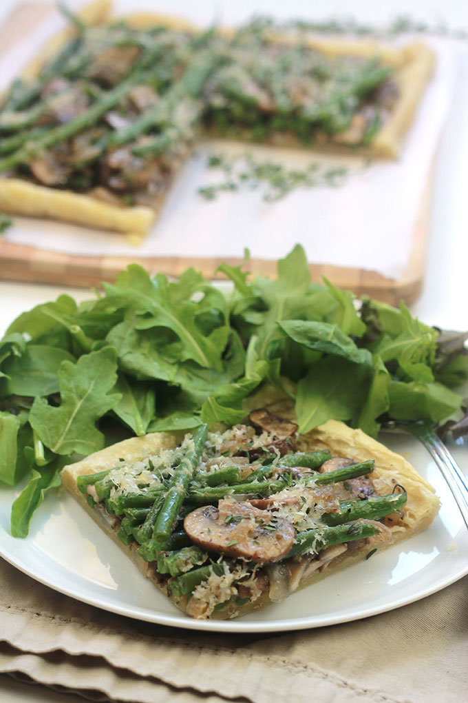 Rustic and savory Easy Mushroom Green Bean Tart. Great dish for a Black Friday brunch, perfect way to use Thanksgiving leftovers.