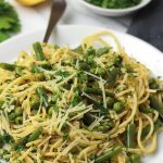Fresh mix of herbs over crisp veggies and tender pasta finished off with a squeeze of lemon juice, this Herbed Green Bean and Pea Pasta sings spring.