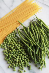 Fresh mix of herbs over crisp veggies and tender pasta finished off with a squeeze of lemon juice, this Herbed Green Bean and Pea Pasta sings spring.