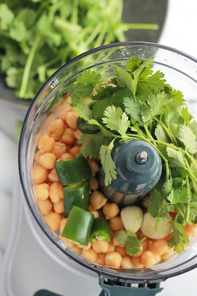 This quick and easy Cilantro Jalapeno Hummus is a wonderful combination of flavors. A take off the traditional hummus recipe, but spiced-up a bit.