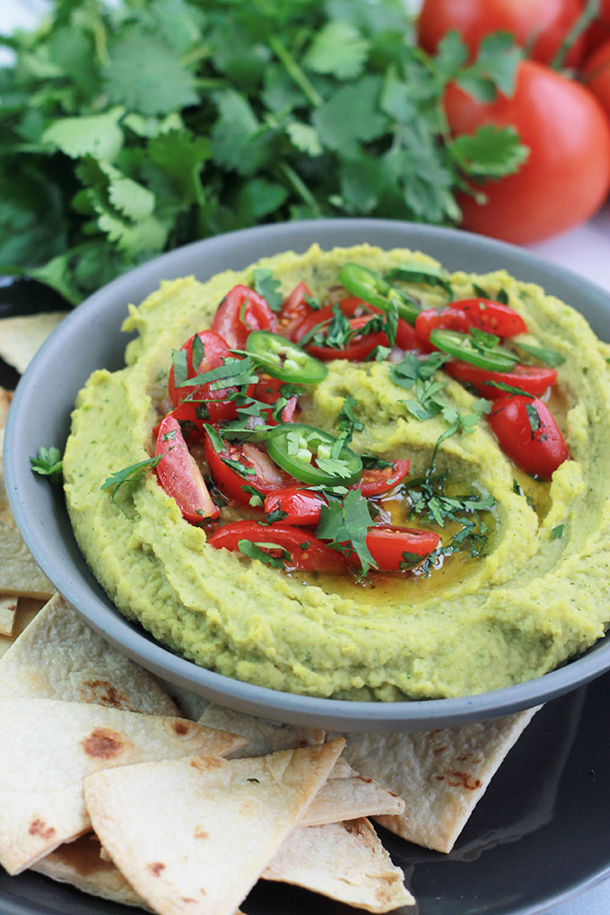 This quick and easy Cilantro Jalapeno Hummus is a wonderful combination of flavors. A take off the traditional hummus recipe, but spiced-up a bit.