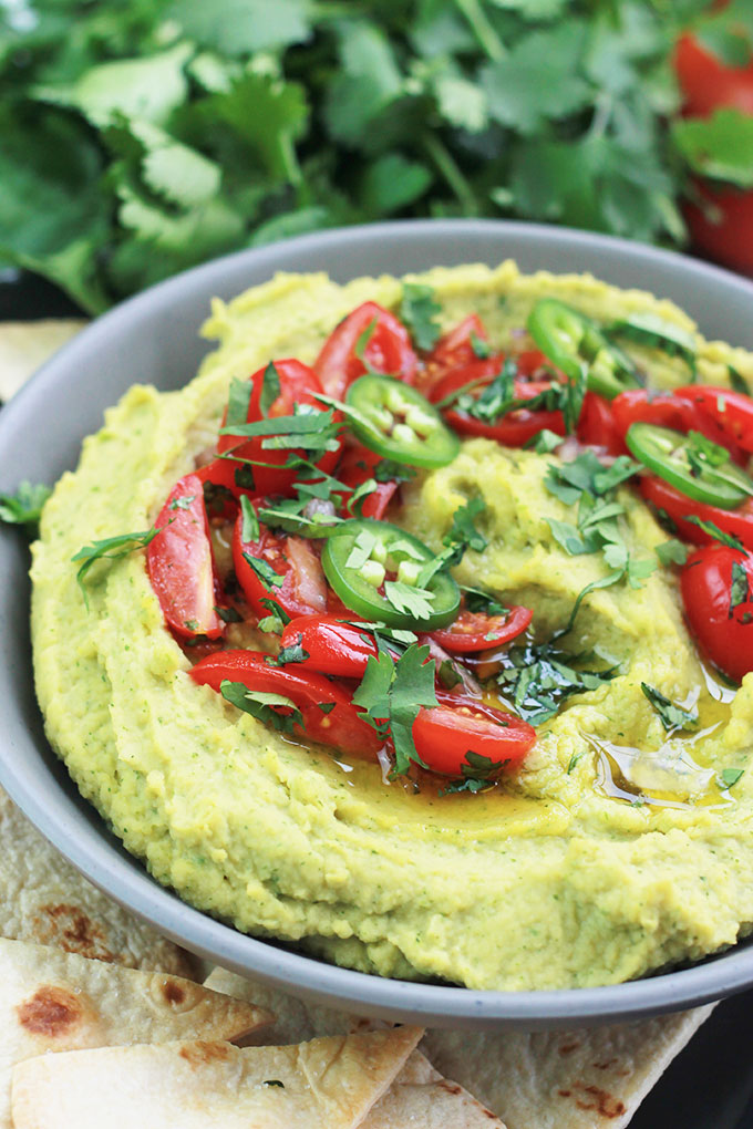 This quick and easy Cilantro Jalapeno Hummus is a wonderful combination of flavors. A take off the traditional hummus recipe, but spiced-up a bit.