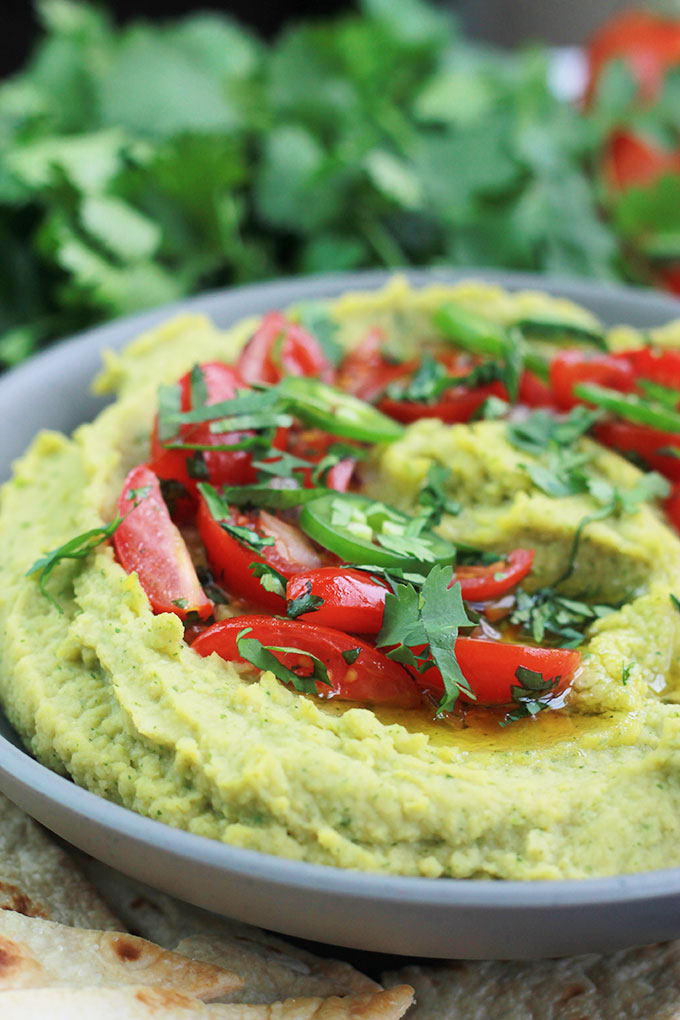 Cilantro jalapeno hummus in a bowl.