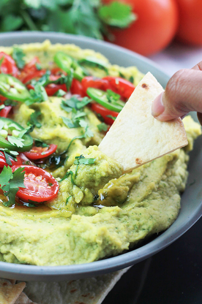 This quick and easy Cilantro Jalapeno Hummus is a wonderful combination of flavors. A take off the traditional hummus recipe, but spiced-up a bit.