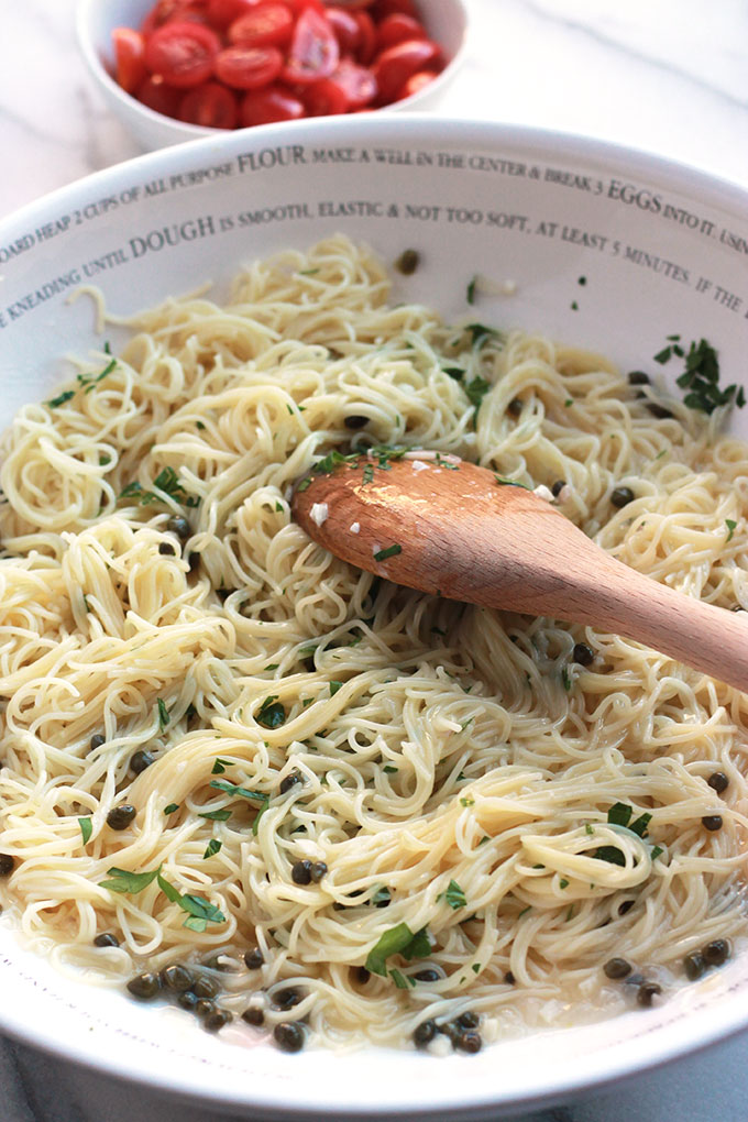 Delicate, delicious and oh-so easy! This Lemon Caper Pasta with Grape Tomatoes can be on the table in less than thirty minutes, perfect when you need a meal fast.