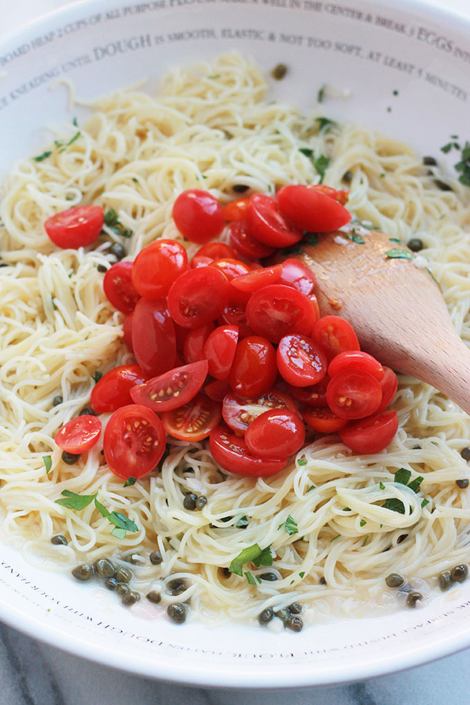 Delicate, delicious and oh-so easy! This Lemon Caper Pasta with Grape Tomatoes can be on the table in less than thirty minutes, perfect when you need a meal fast.