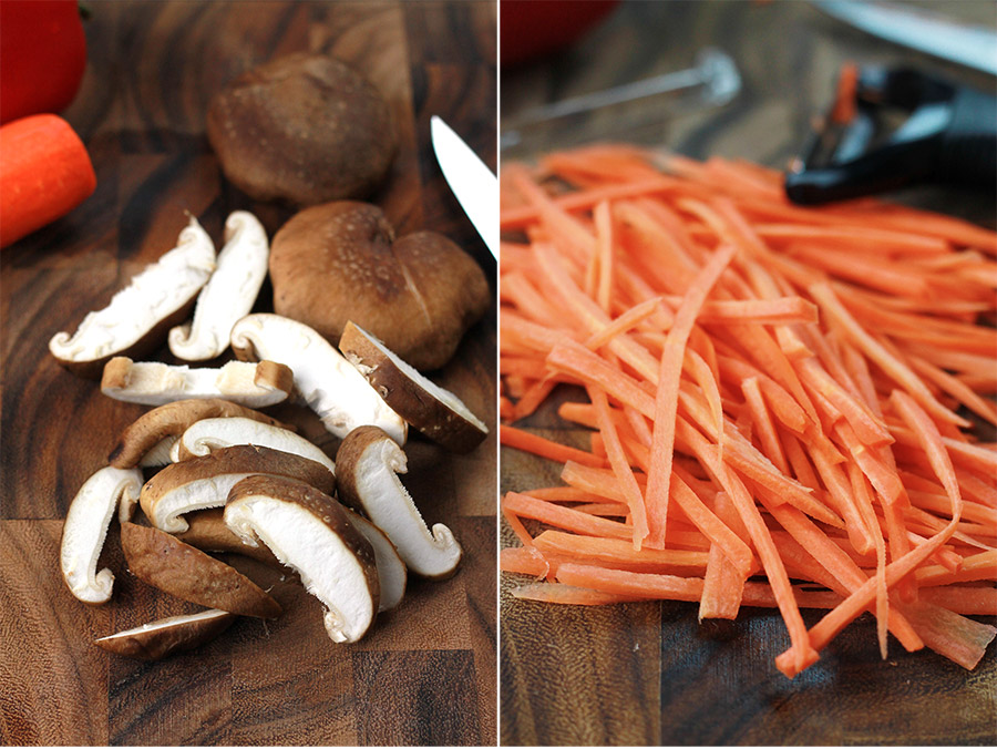 Sliced mushrooms and carrots on End Grain cutting board.