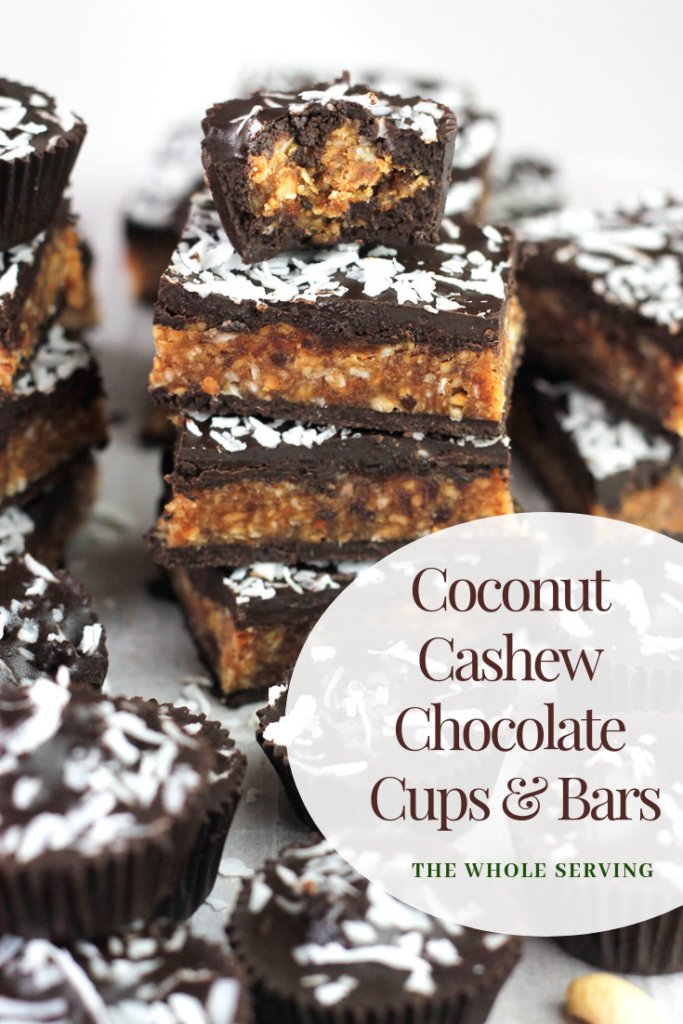 Angled shot of Coconut Cashew Chocolate Cups and a stack of Bars.