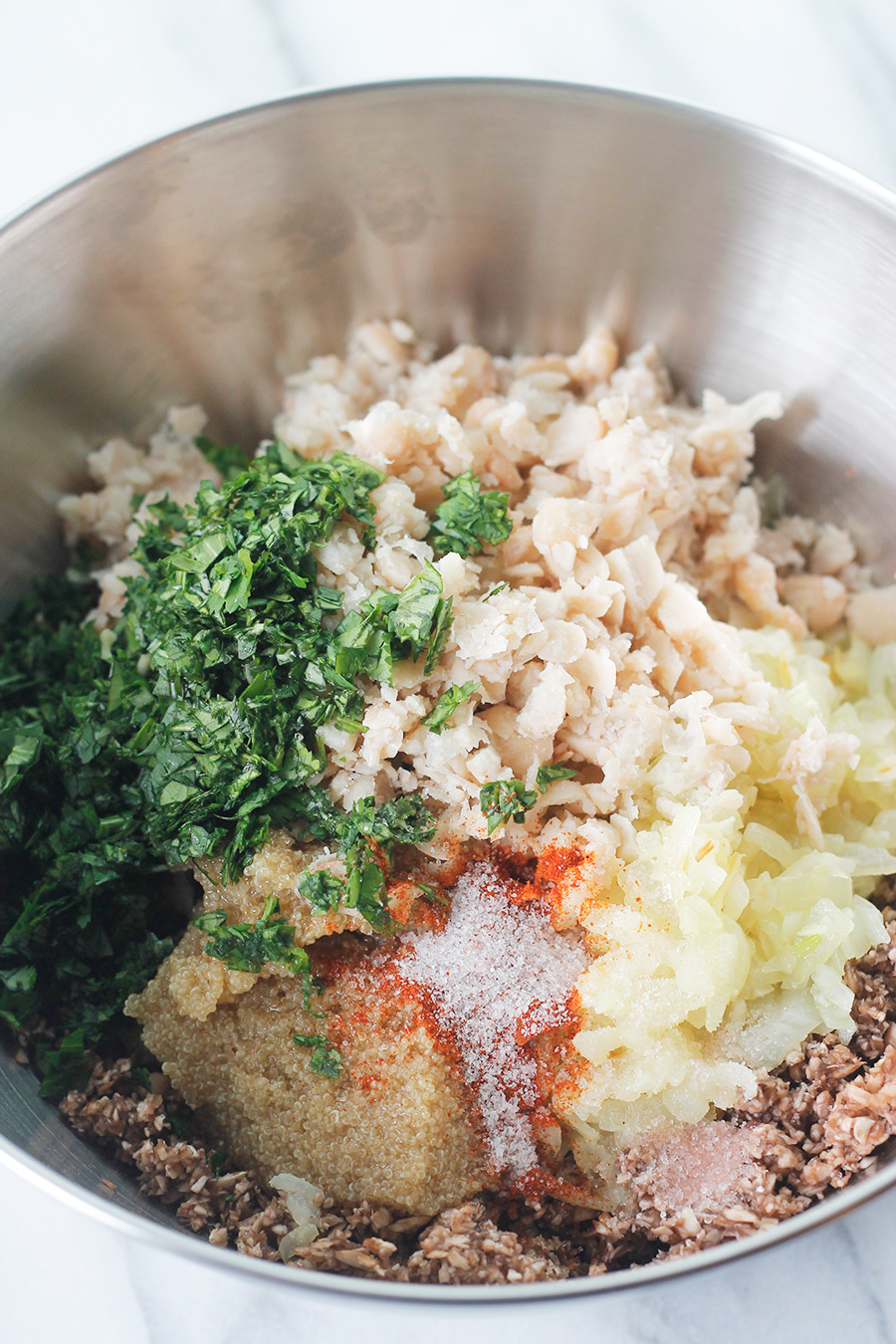 Overhead shot of easy meatless meatball ingredients in stainless bowl.