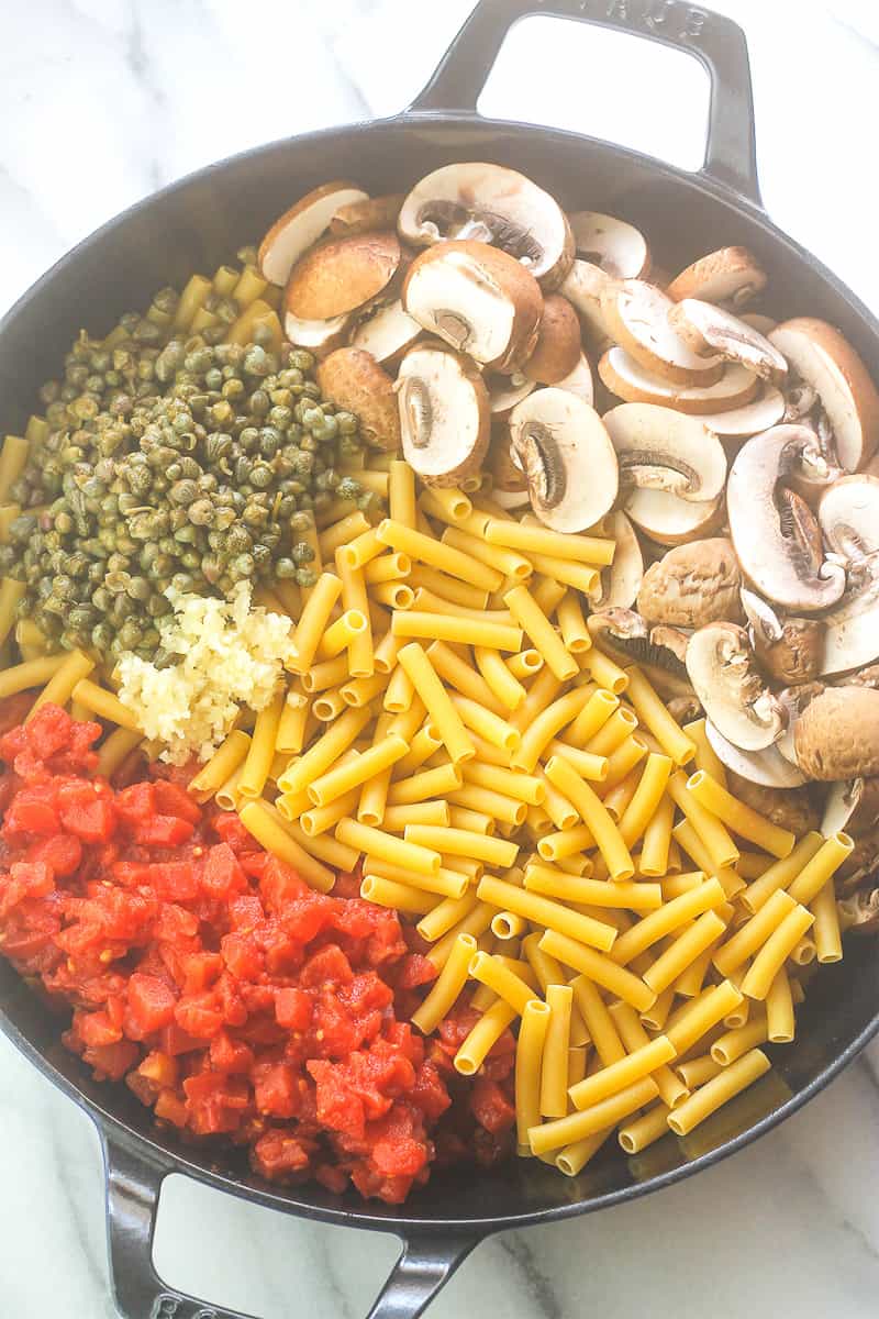 Overhead shot of uncooked ingredients for one-pot pasta.