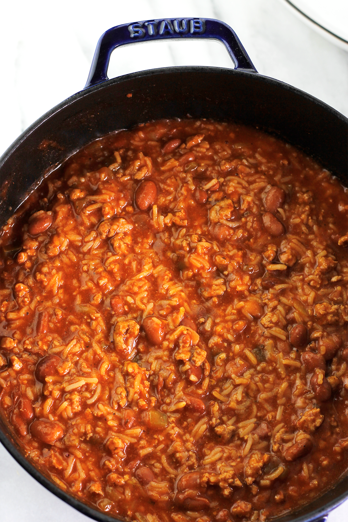 Overhead shot of Turkey Enchilada Rice and Beans in pot.
