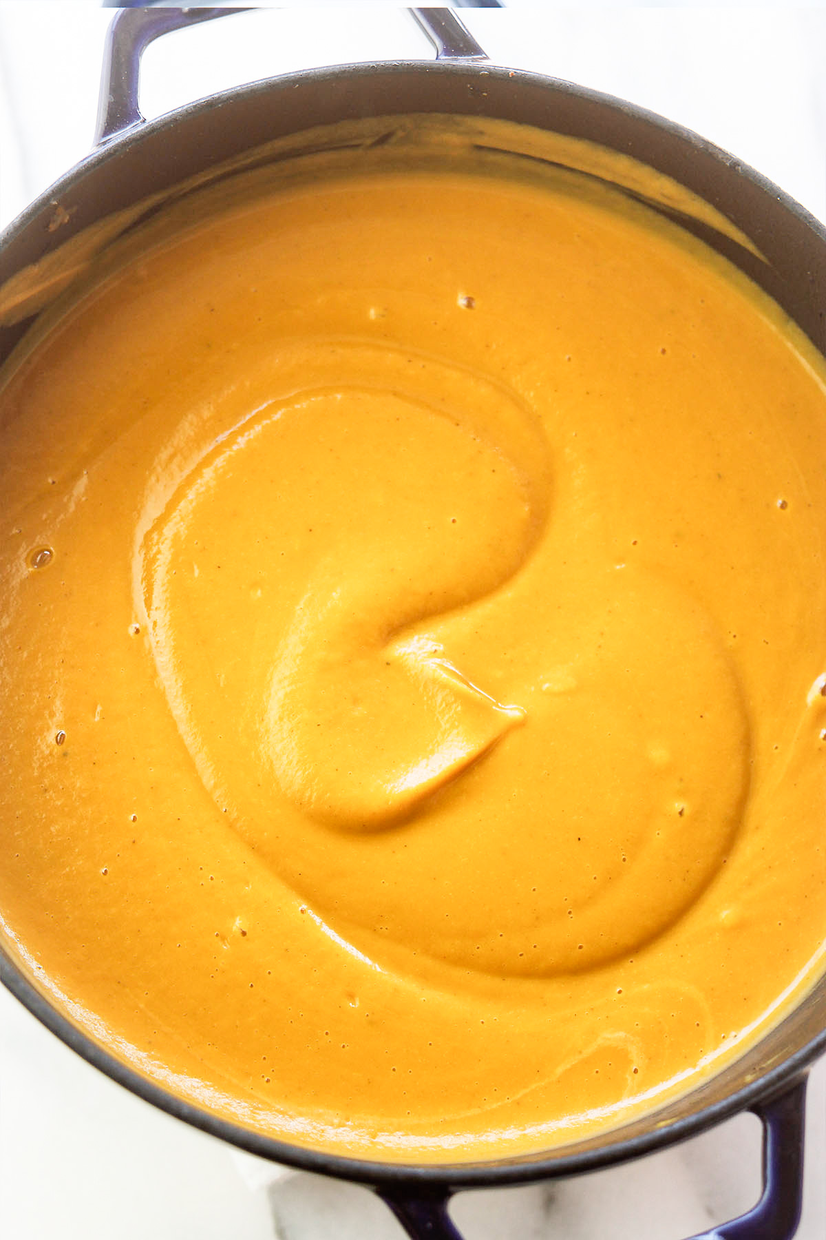 Overhead shot of completed creamy butternut soup.
