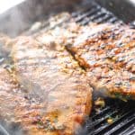 Grilled chicken breast on grill pan.