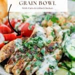 Shot of Mediterranean grain bowl with grilled chicken and fresh vegetables.