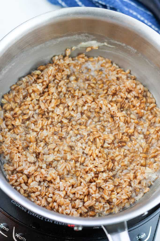 Overhead shot of cooked farro in a saucepan.