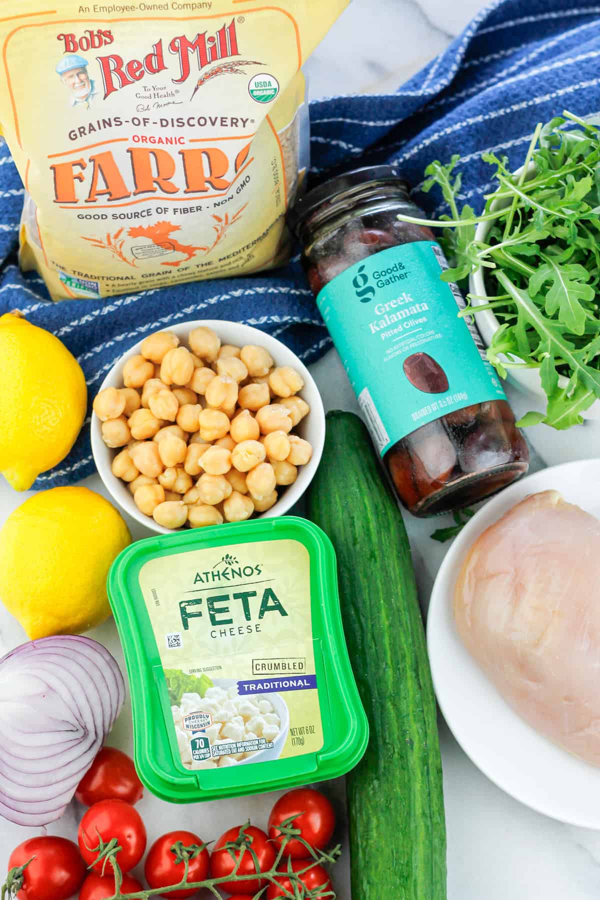 Overhead shot of ingredients for mediterranean grain bowl.