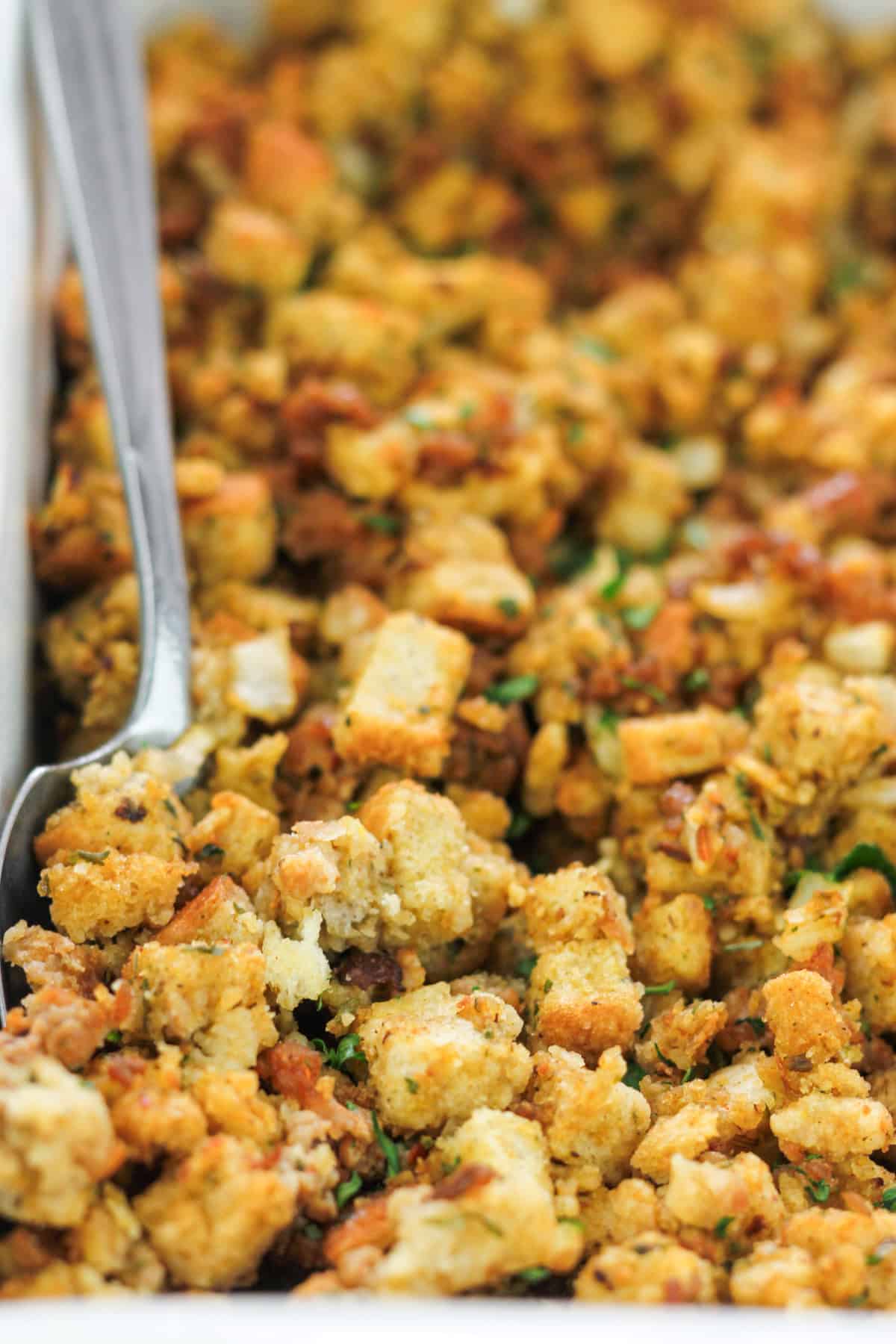 Baked Italian-Inspired sausage stuffing in baking dish.