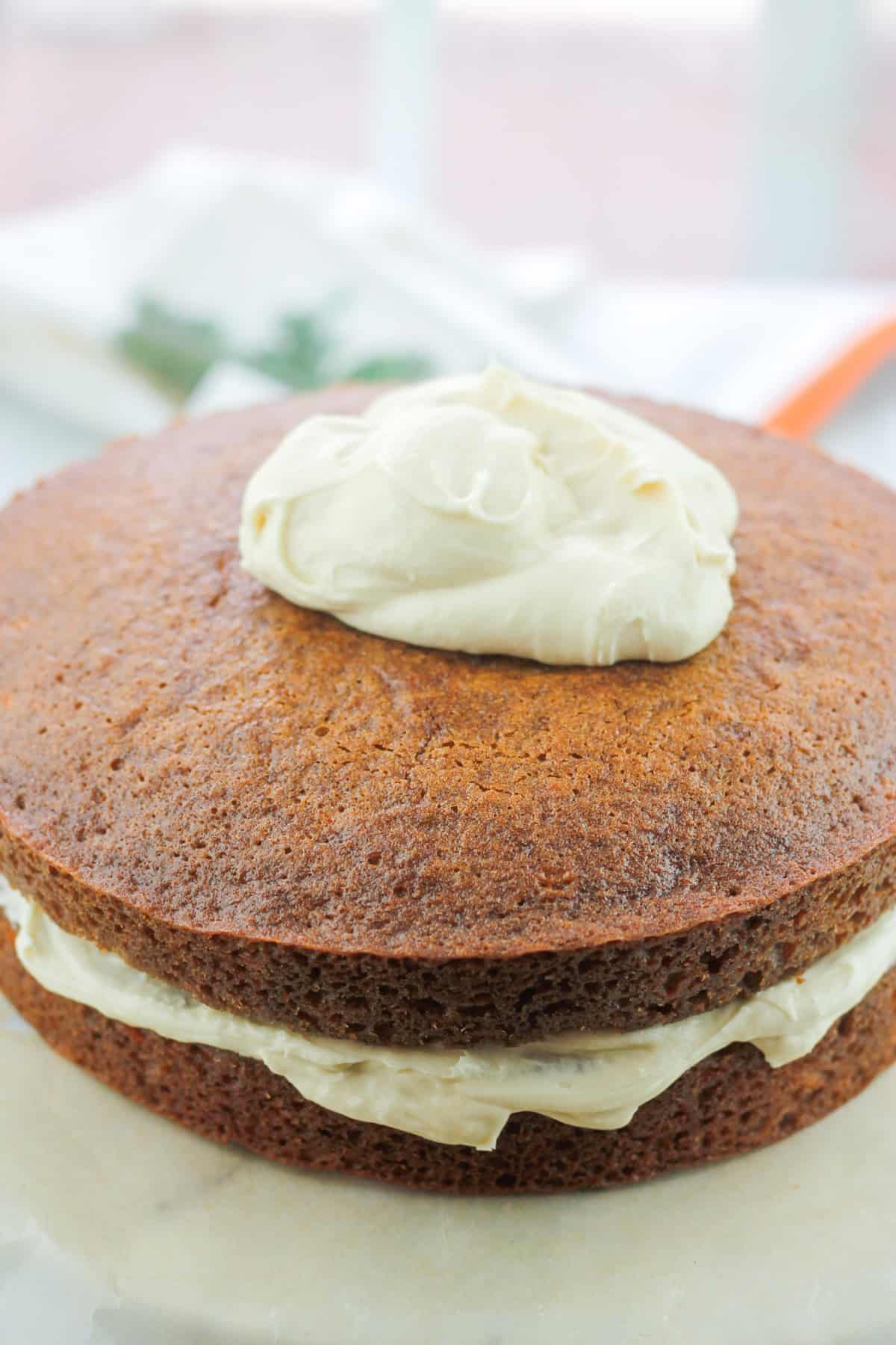 Baked carrot cake with brown sugar cream cheese frosting.