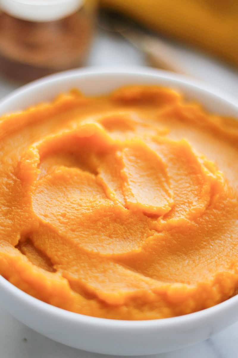 Close-up of a bowl of homemade pumpkin puree.