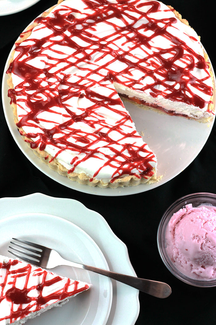 Strawberry Peach Pie, a delicious pie topped off with smooth and creamy whipped coconut cream. from The Whole Serving for https://ThisSillyGirlsKitchen.com